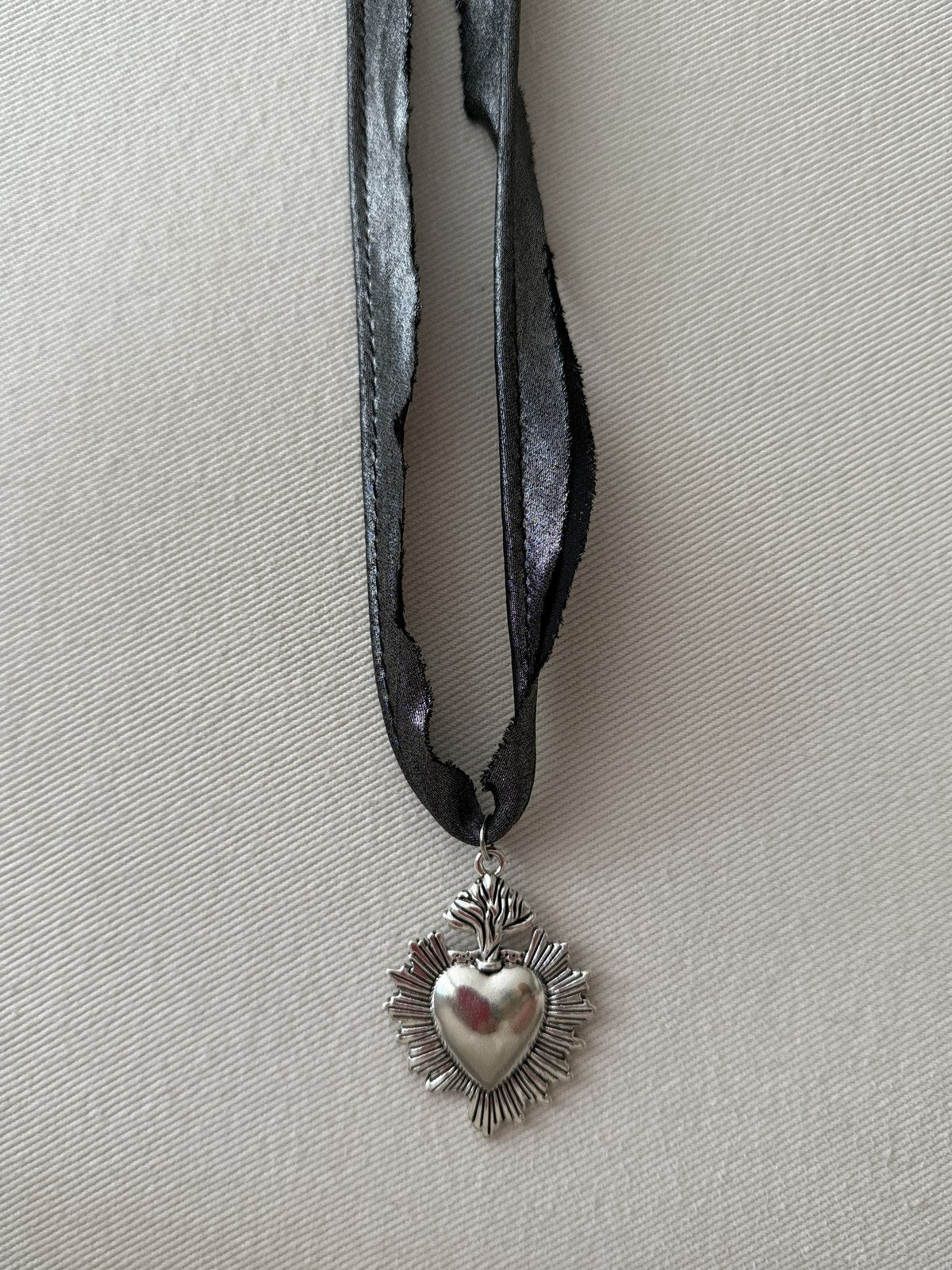 Collar detente — Plata