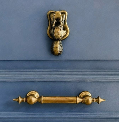 Golpeador puerta ardilla