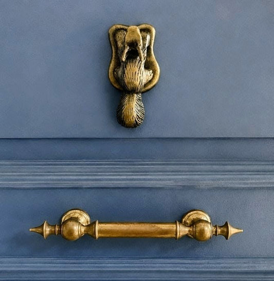 Golpeador puerta ardilla